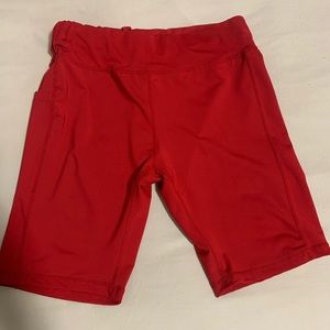 Side phone pocket sports shorts